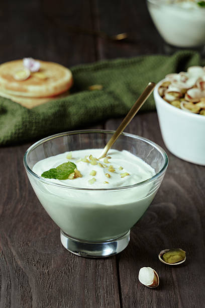 istock Pistachio Yogurt Served in Glass Bowl 2228808771