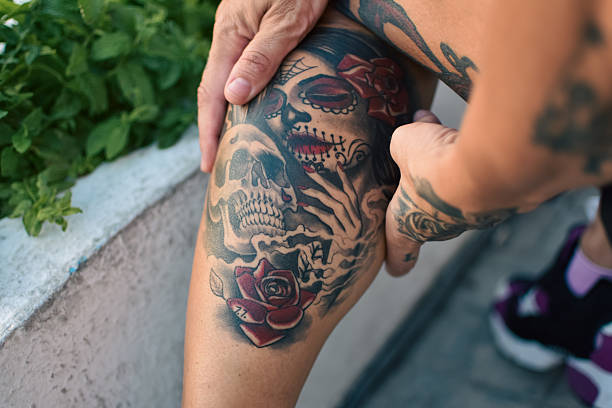 istock woman with a tattoo 2228810748