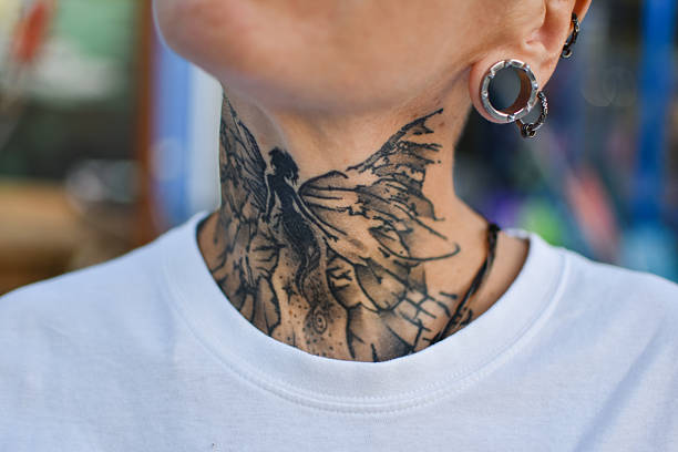 a woman with tattoos on various parts of her body