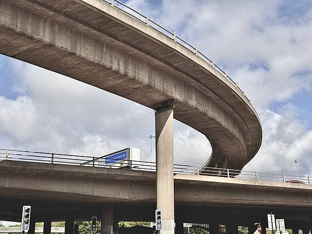 istock A curved road intersection in Glasgow against cloudscape 2228813001