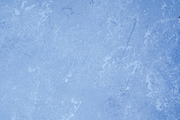 istock Light blue wall with smooth grunge plaster and faded surface texture 2228815874