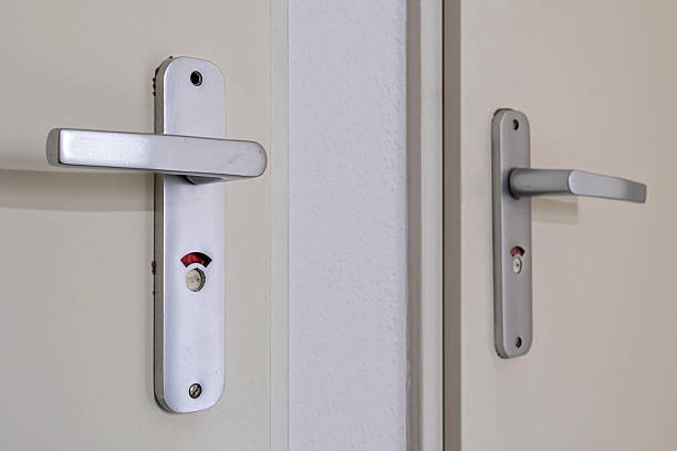 istock bathroom door handle showing occupied 2228818993