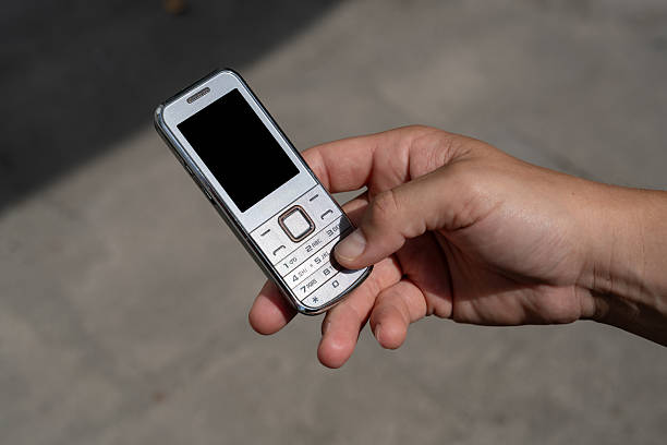 istock Man Practicing Digital Detox with a Vintage Mobile Phone 2228819027