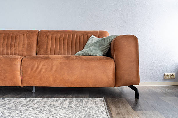 istock brown leather sofa in apartment 2228819188