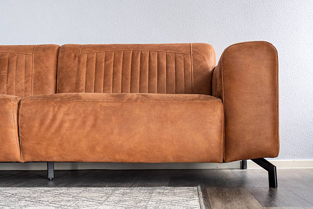 istock brown leather sofa in apartment 2228819190