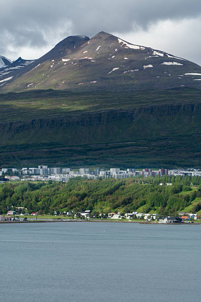 Looking across the bay of water at Akureyri Iceland