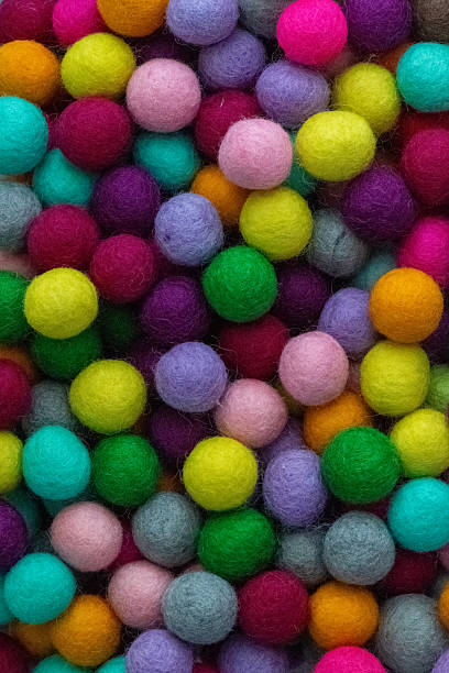 istock Colorful felt wool balls background, full frame 2228824871