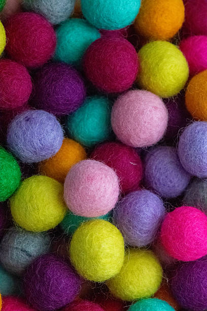 istock Colorful felt wool balls background, full frame 2228824919