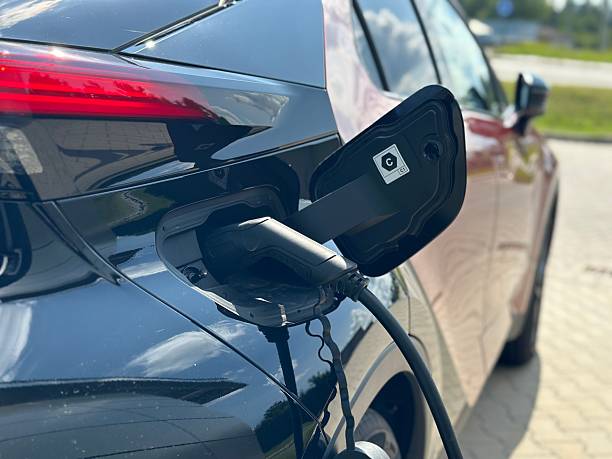 istock Charging an Electric Car – Clean Energy Transportation Concept 2228831769