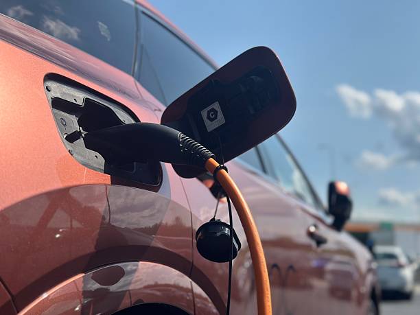 istock Charging an Electric Car – Clean Energy Transportation Concept 2228831814