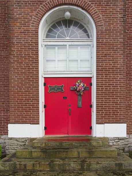 istock Red church archway door 2228840050