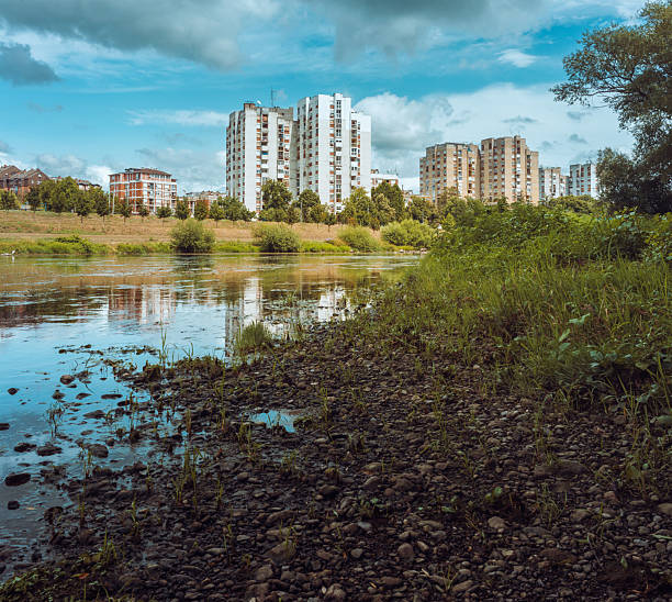 istock Buildings by the river in summer 2228842482