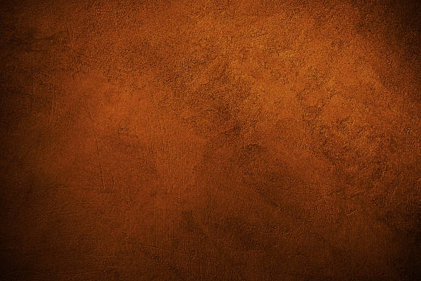 istock Black dark red brown burnt orange rough grunge texture background. Toned concrete wall surface. Close-up. Space for design. 2228850210