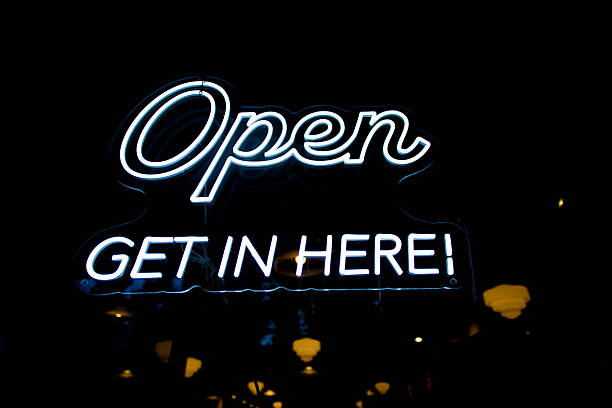 istock White Neon Sign on Black Reading 