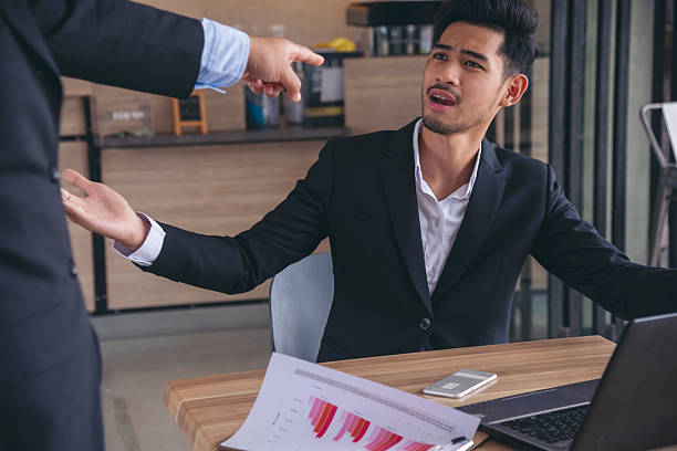istock Recession Stress man using laptop work hard at home office headache, depressed from failure business burnout. Tired Asian man despair stress overworked pain sadness life problems frustration. 2228865573