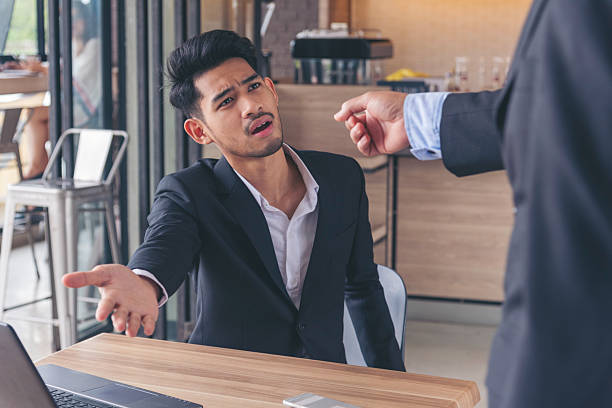 recession stress man using laptop work hard at home office headache, depressed from failure business burnout. tired asian man despair stress overworked pain sadness life problems frustration. - 困る 外国 ストックフォトと画像