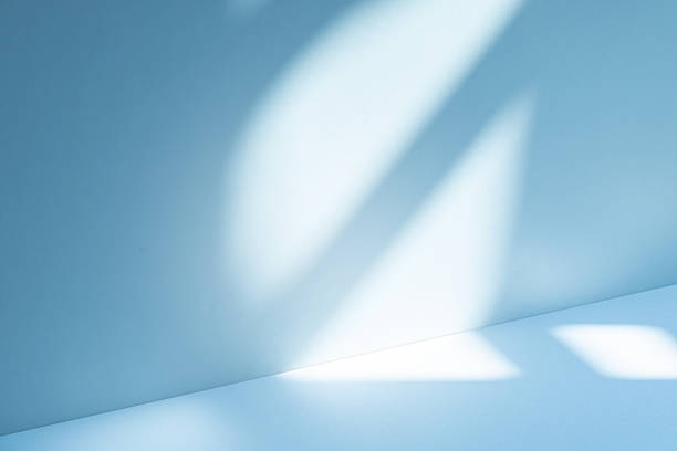 istock Studio style background wall decoration presentation uses white and blue tones. with shadows cast from a nearby window, concept creating a decorative 2228868761