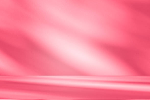 istock Wall interior background, studio, and backdrops show products. with shadow from window color white and pink light. background for text insertion and presentation of product 2228868793