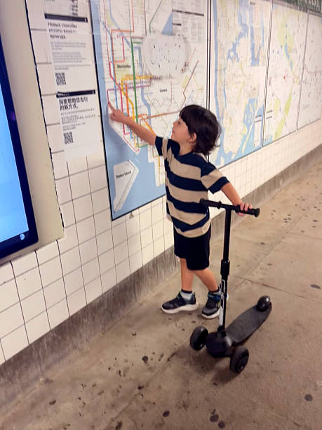 View of boy inside of a subway train station