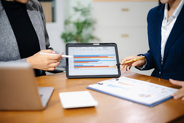 istock Business team collaboration discussing working analyzing with financial data and marketing growth report graph in team, presentation and digital tablet, laptop. 2228875591