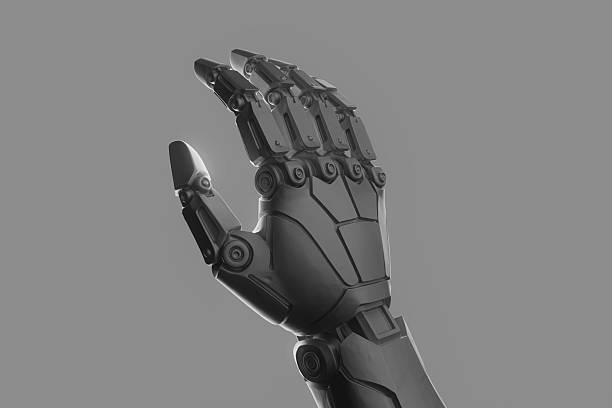 A robot hand with a black and silver color. The hand is pointing up. The robot hand is made of metal