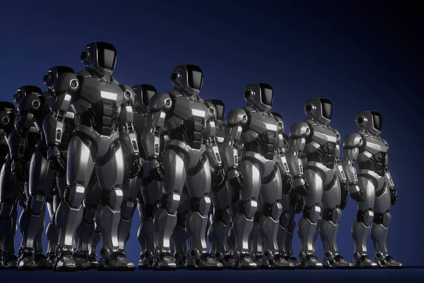 istock A group of robots are lined up in a row 2228876069