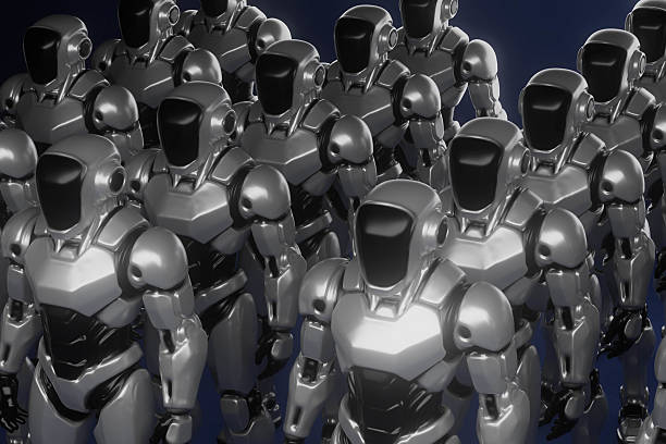 istock A group of robots are standing in a line 2228876098