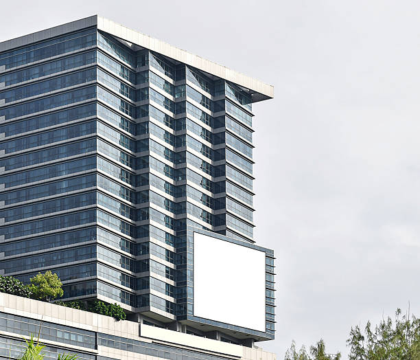 istock Mock up white horizontal large LED display billboard on building. Clipping path for mockup 2228877760