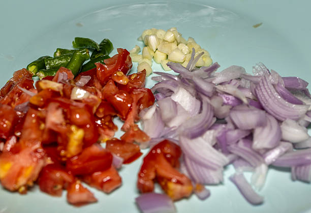 istock chopped kitchen vegetables in ceramic plate at indoor 2228881067