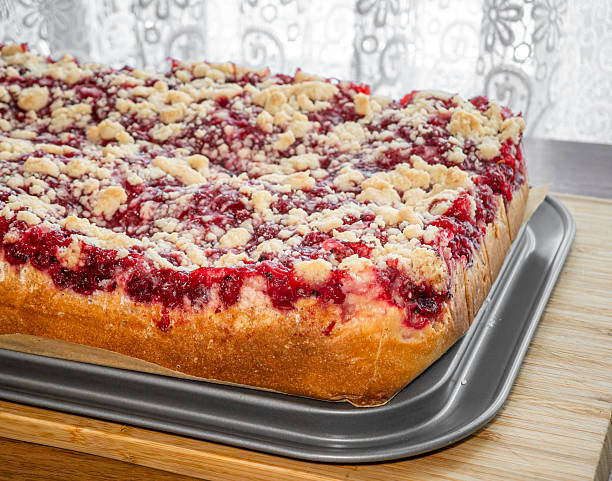 Sweet currant yeast cake with crumble, close-up