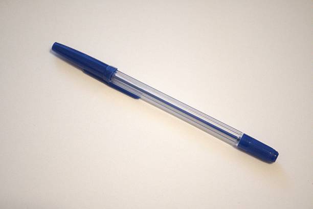 istock Blue pen on white background, close-up with copy space 2228883064