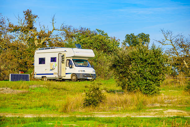 Caravan camping on nature in Portugal. Camper trip.