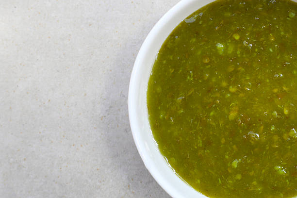 istock Thai green seafood dipping sauce in a small ceramic bowl 2228884453