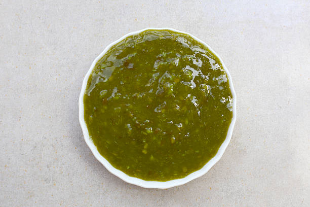 istock Thai green seafood dipping sauce in a small ceramic bowl 2228884465