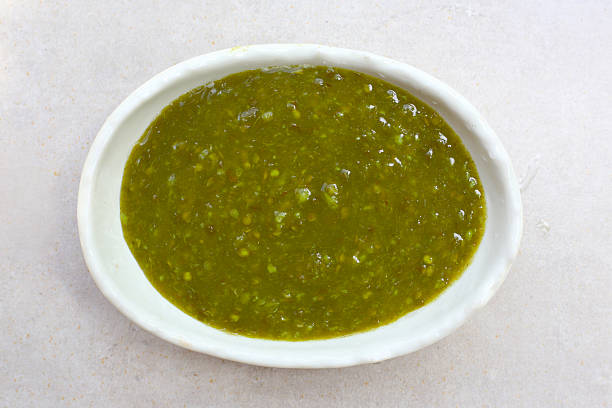 istock Thai green seafood dipping sauce in a small ceramic bowl 2228884966