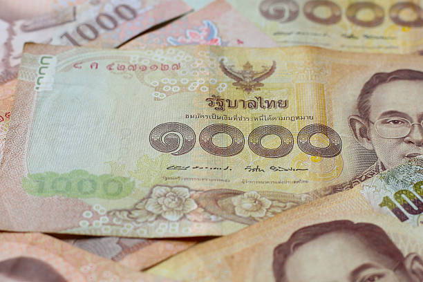 istock Stack of one thousand Thai baht banknotes 2228886927