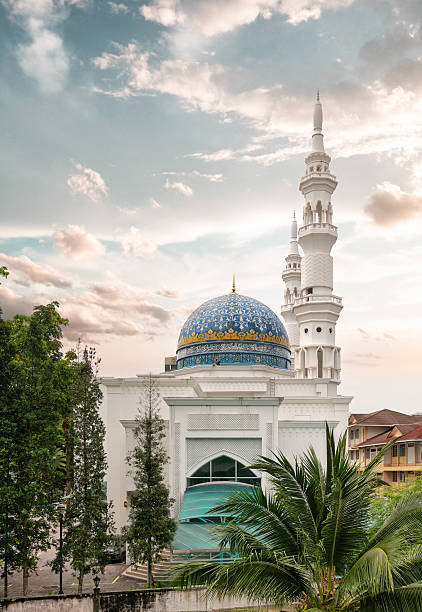 istock Al-Bukhari Foundation Mosque, Kuala Lumpur, Malaysia. Blue dome and white minarets under a cloudy sky 2228887098