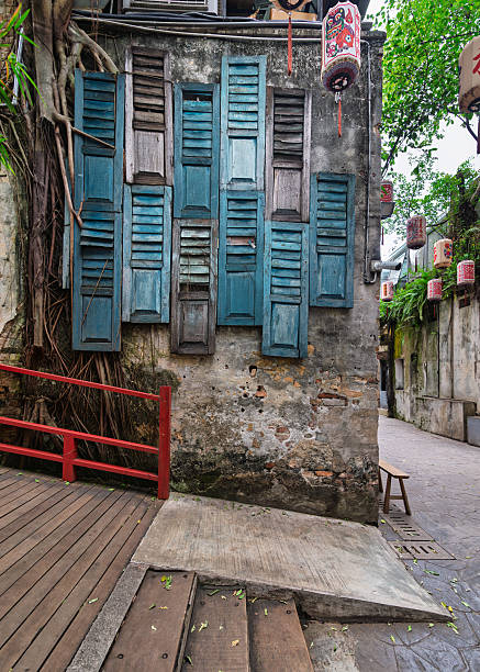 Kwai Chai Hong: Historic Building with Blue Shutters and Banyan Tree Roots, Kuala Lumpur, Malaysia