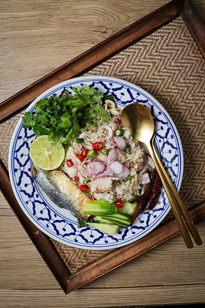 Spicy Mackerel Salad With Rice on ceramic plate