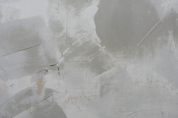 istock Grunge gray cement wall texture background. Abstract grunge cement wall texture background. 2228889405
