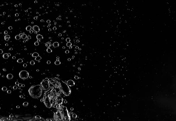 istock Underwater bubbles, Underwater oxygen design concept, Small water drops on black background, Close-up photography. 2228892075