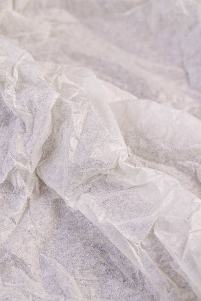 istock crumpled light-colored wrapping paper after prolonged use 2228892583