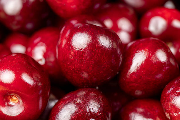 istock red cherry berries , red cherry fruits on the kitchen table closeup 2228892657