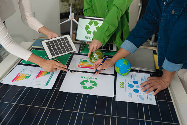 istock colleagues discussing data working and tablet, laptop with on Construction Site project, green energy and solar panel concept. 2228894001