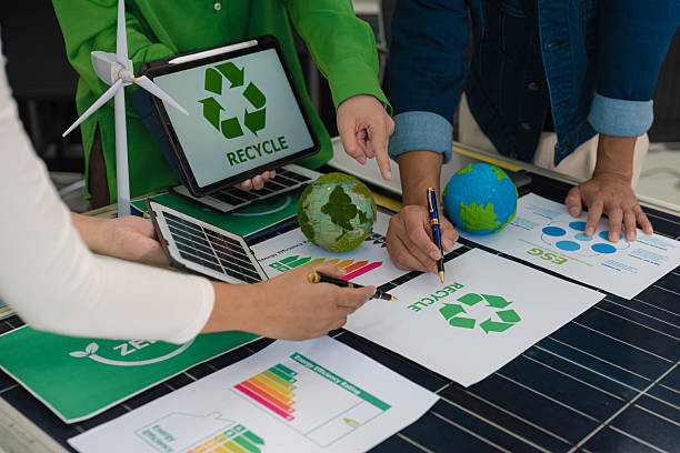 istock colleagues discussing data working and tablet, laptop with on Construction Site project, green energy and solar panel concept. 2228894013