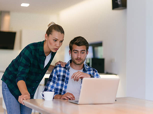 istock Couple Video Calling on Laptop 2228894153
