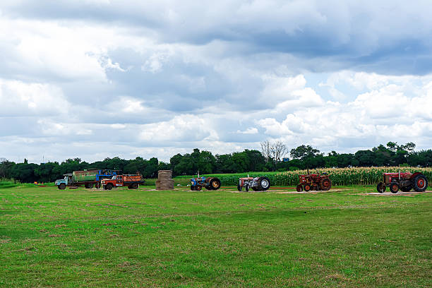istock Farm Vehicles in Grass Field 2228894850