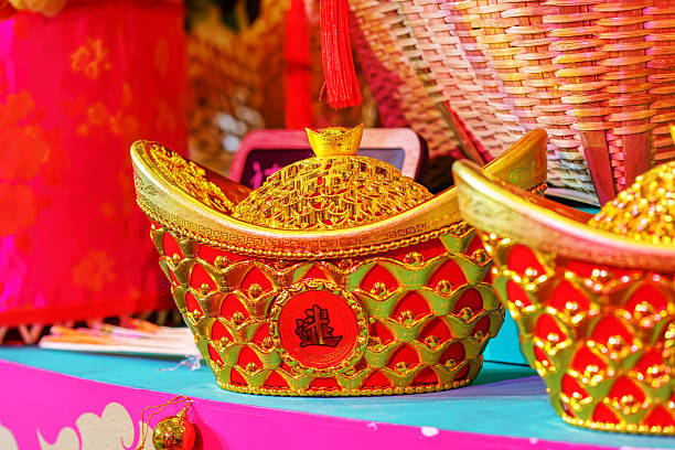 istock Golden Yuanbao Ingots Display 2228895050