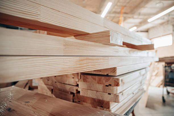 istock Stacked Wooden Planks in a Carpentry Workshop 2228896478