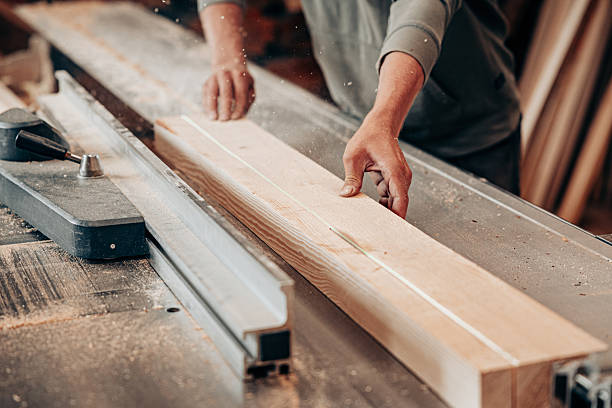 istock Cutting Timber on Table Saw in Woodworking Workshop 2228899836